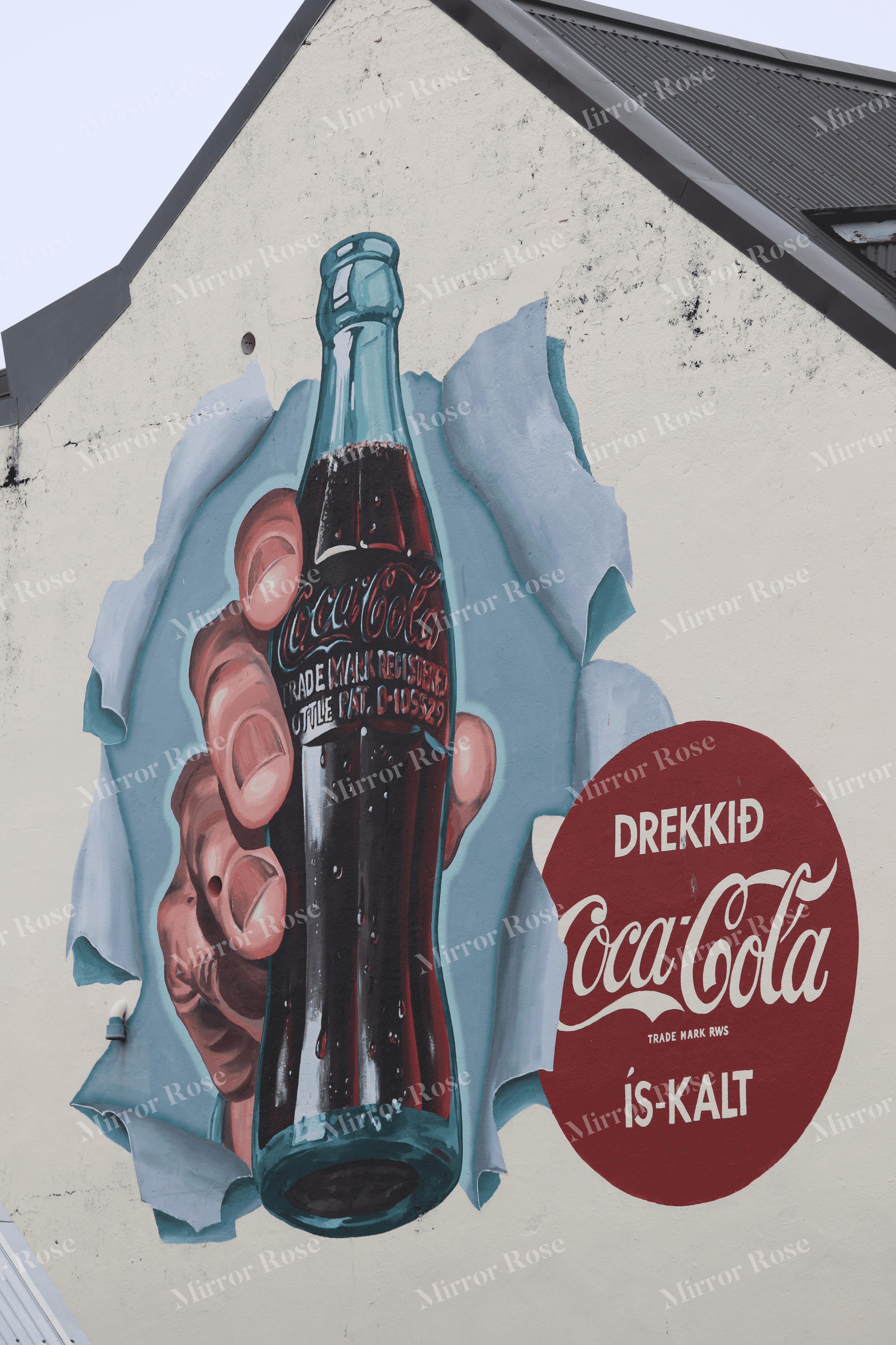 vibrant nordic mural art featuring coca-cola in iceland