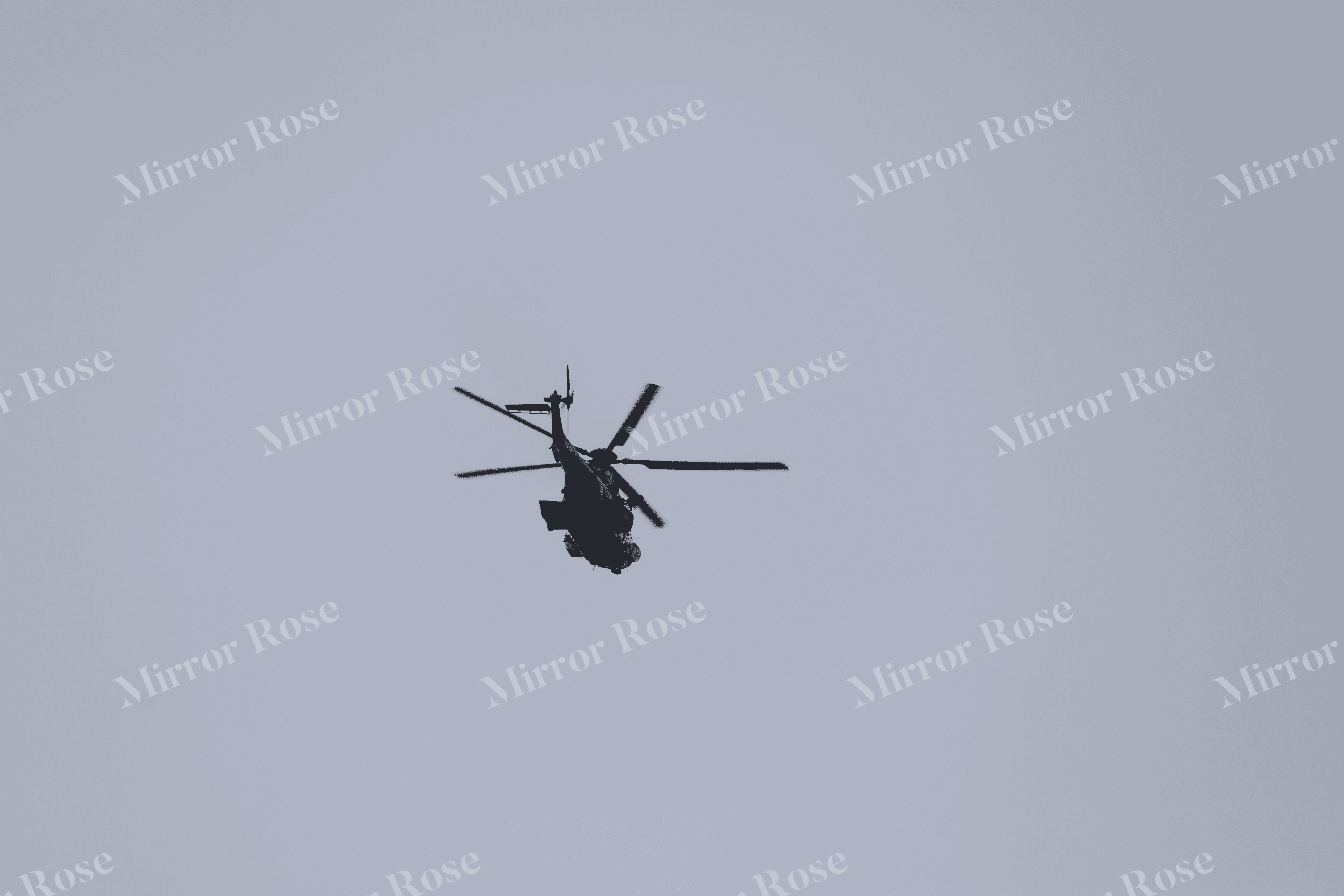 helicopter in a nordic sky